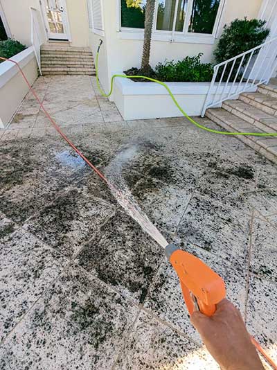 Images of driveway pressure wash in Indian River County