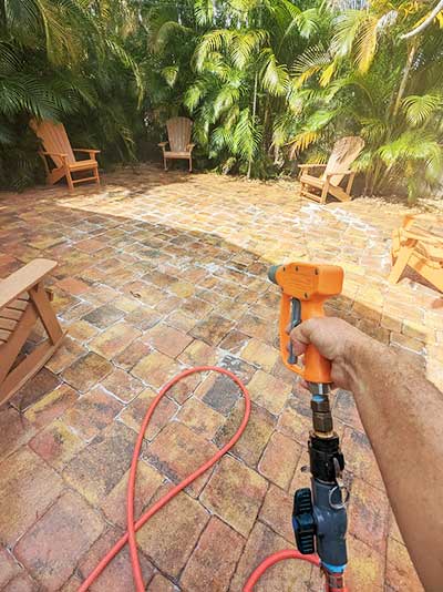 Images of driveway pressure cleaning in Indian River County