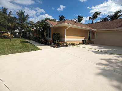 Images of driveway pressure wash in Indian River County